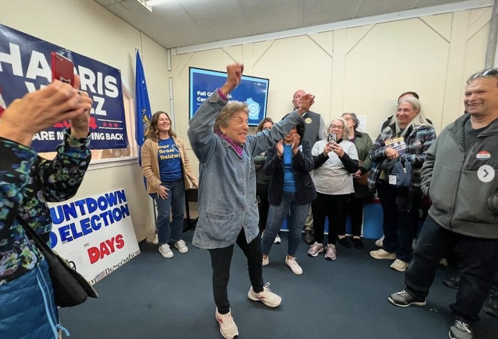 A volunteer celebrates at a Wisconsin field office